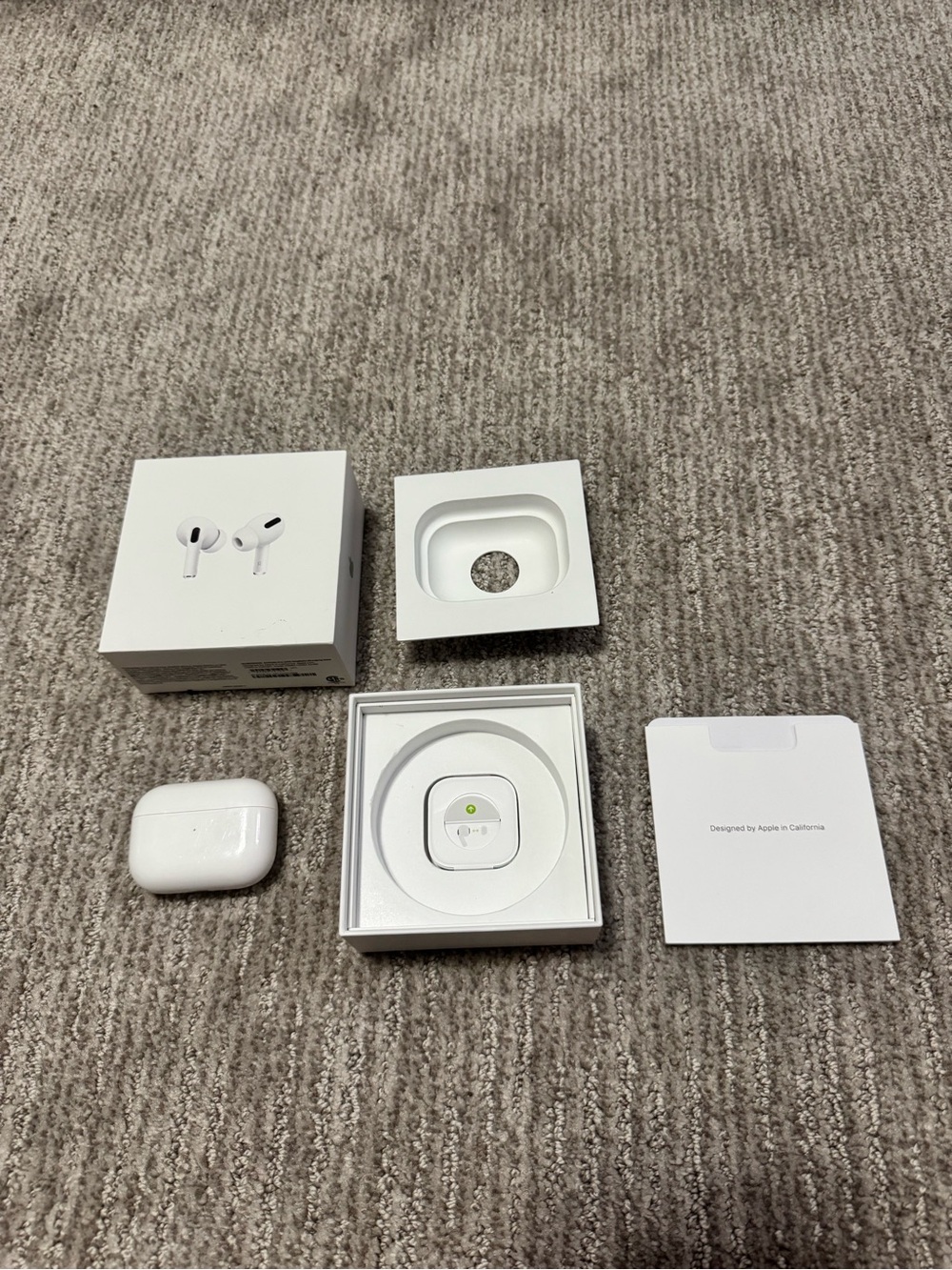 Apple AirPods Pro Earbuds with White Charging Case and Packaging